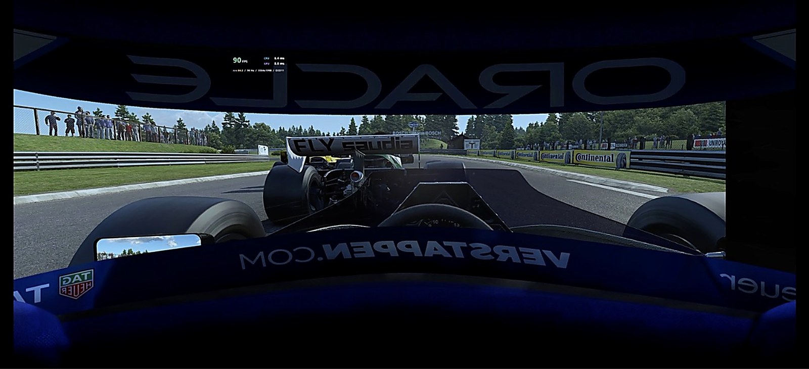 NextLevelCreator output in OBS: a cockpit view through a full racing helmet visor, following a historic F1 car, with the performance panel reading 90 FPS at the top of the visor